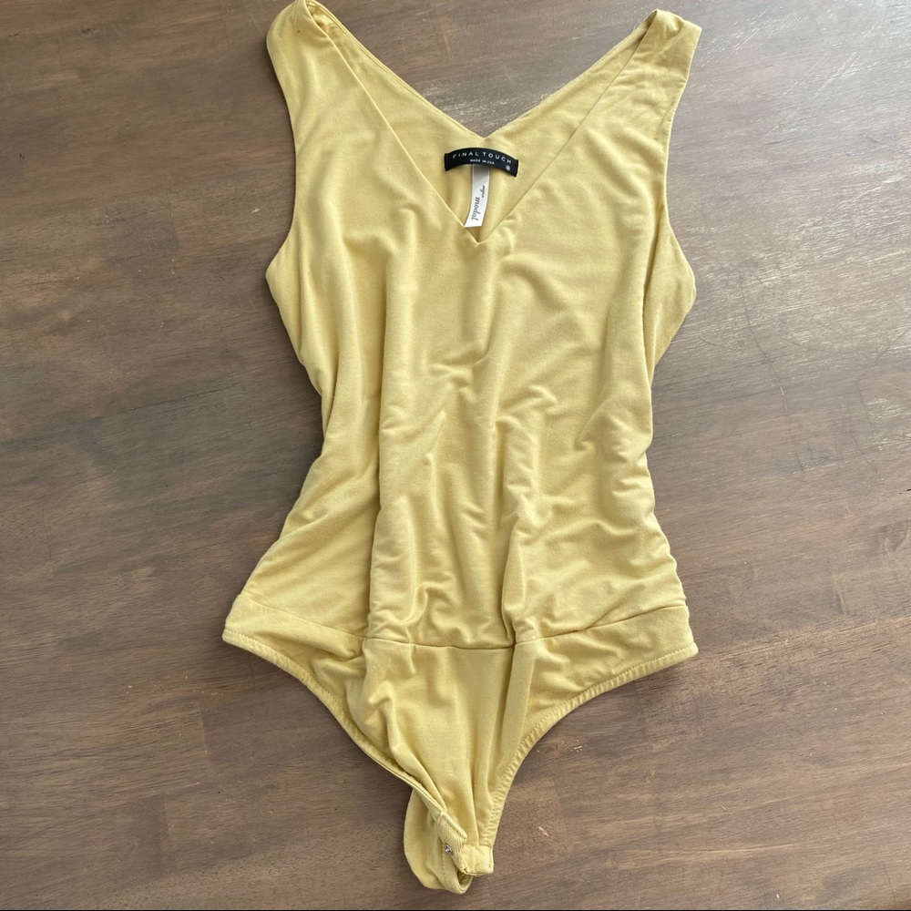 Final touch Women’s Medium light yellow body suit NWT